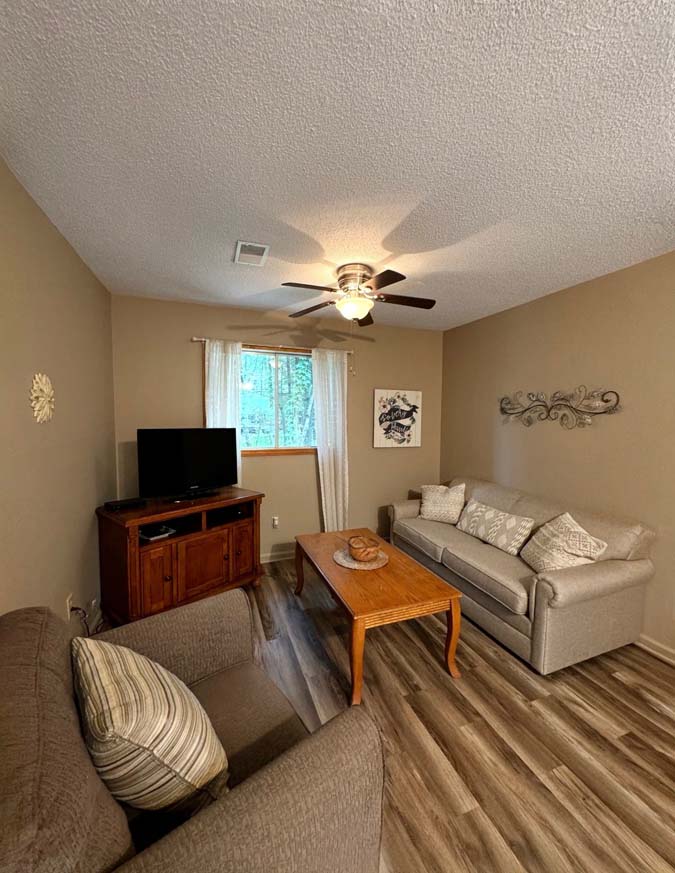 The Dogwood at Timberline Cabins bedroom, living room