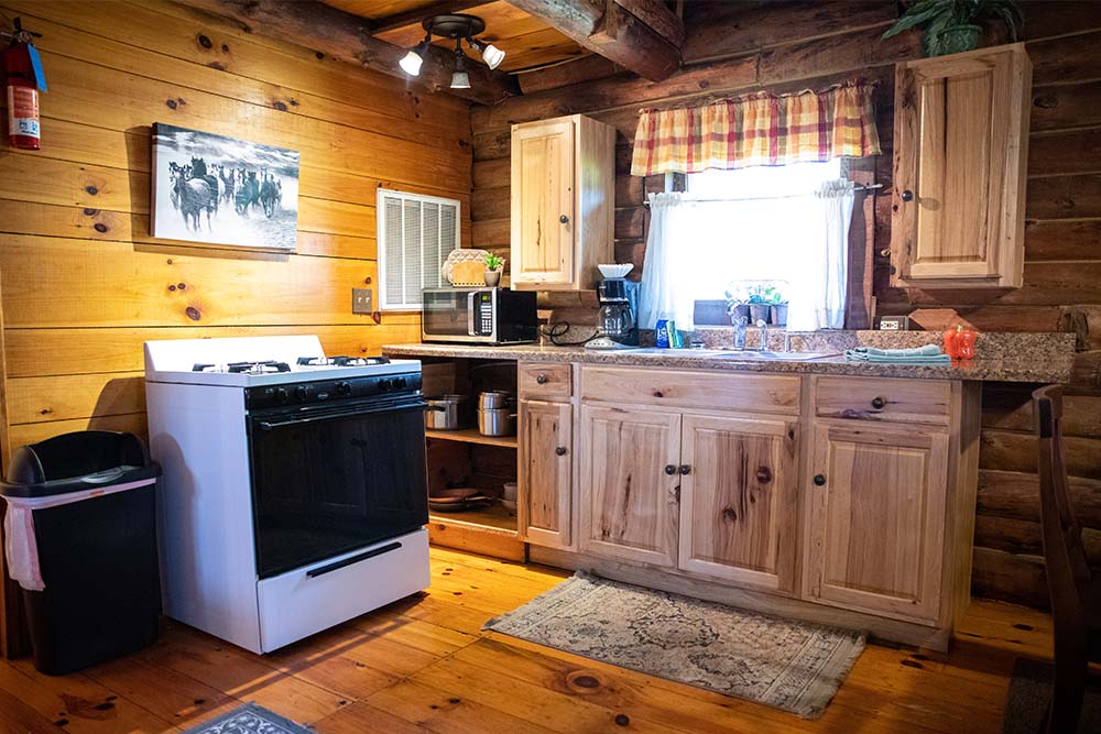 Kitchen, wood cabinets and white stove