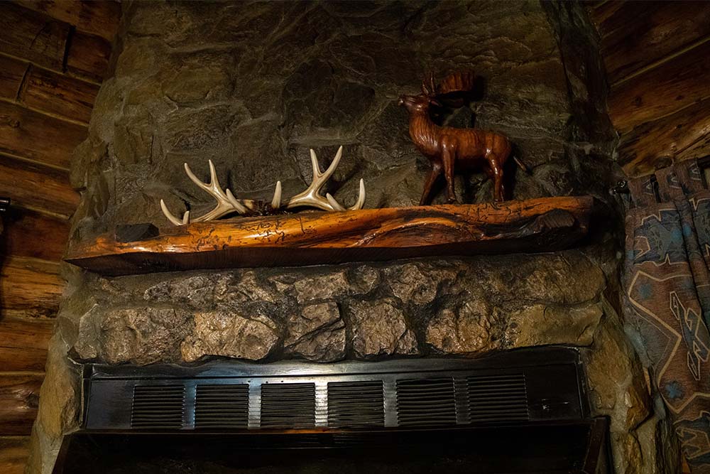 Wood mantel above fireplace